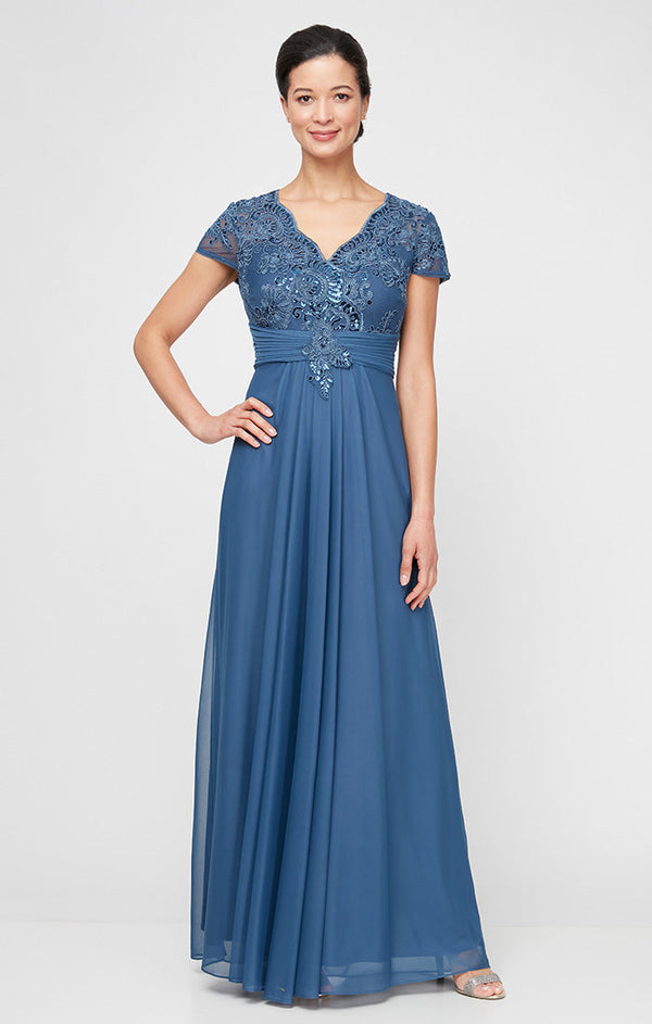 Plus - Long Surplice Neckline A-Line Dress with Embroidered Pleated Waist and Scallop Detail