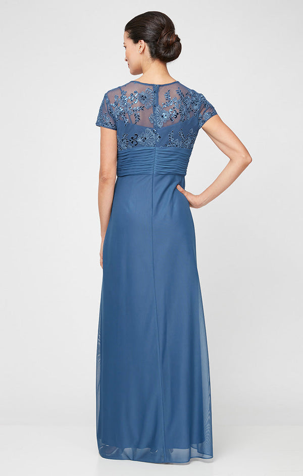 Plus - Long Surplice Neckline A-Line Dress with Embroidered Pleated Waist and Scallop Detail