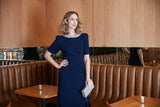 Long Embellished Neck Dress with Elbow Sleeves and Cascade Detail Skirt